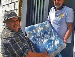 Distribute fishing nets to fishermen in Abdeh & Nakoura